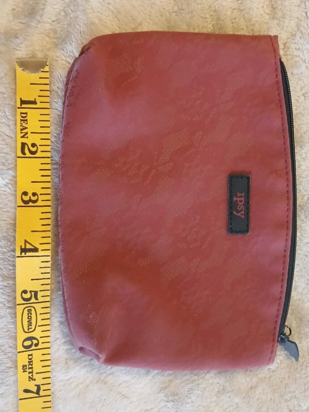 ispy red versatile bag with bat zipper closure